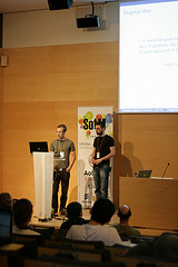 Maxime and Thomas giving the MapOSMatic talk