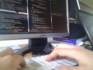 Maxime working on his TypeMatrix Dvorak keyboard, editing OCitySMap code with vim